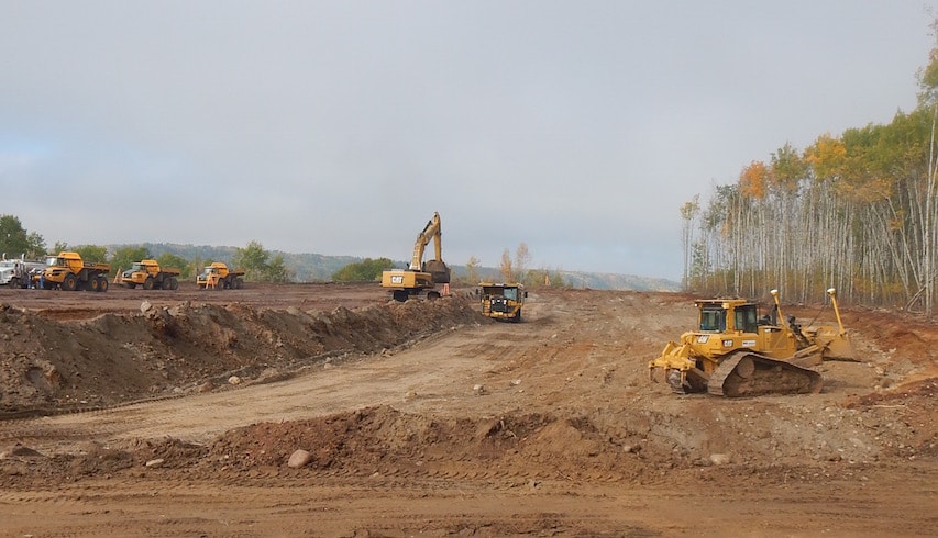 Excavation of material; part of the left bank stabilization on the north bank of the Site C dam site.