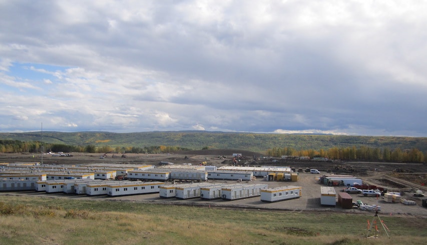 Temporary trailers are assembled on the north bank of the Site C dam site.