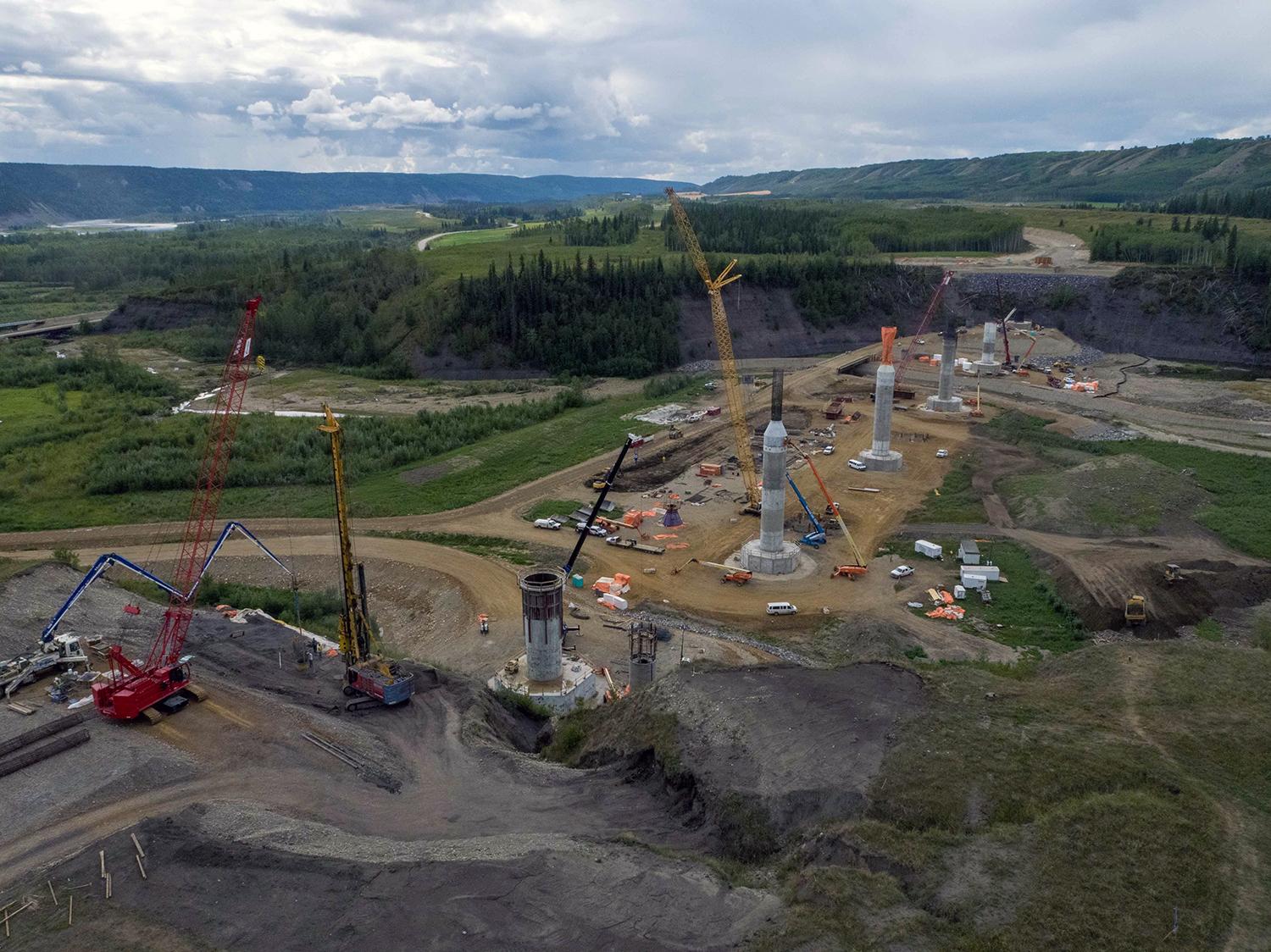 Shear pile work is happening on the Cache Creek bridge segment of the Highway 29 realignment. | August 2021
