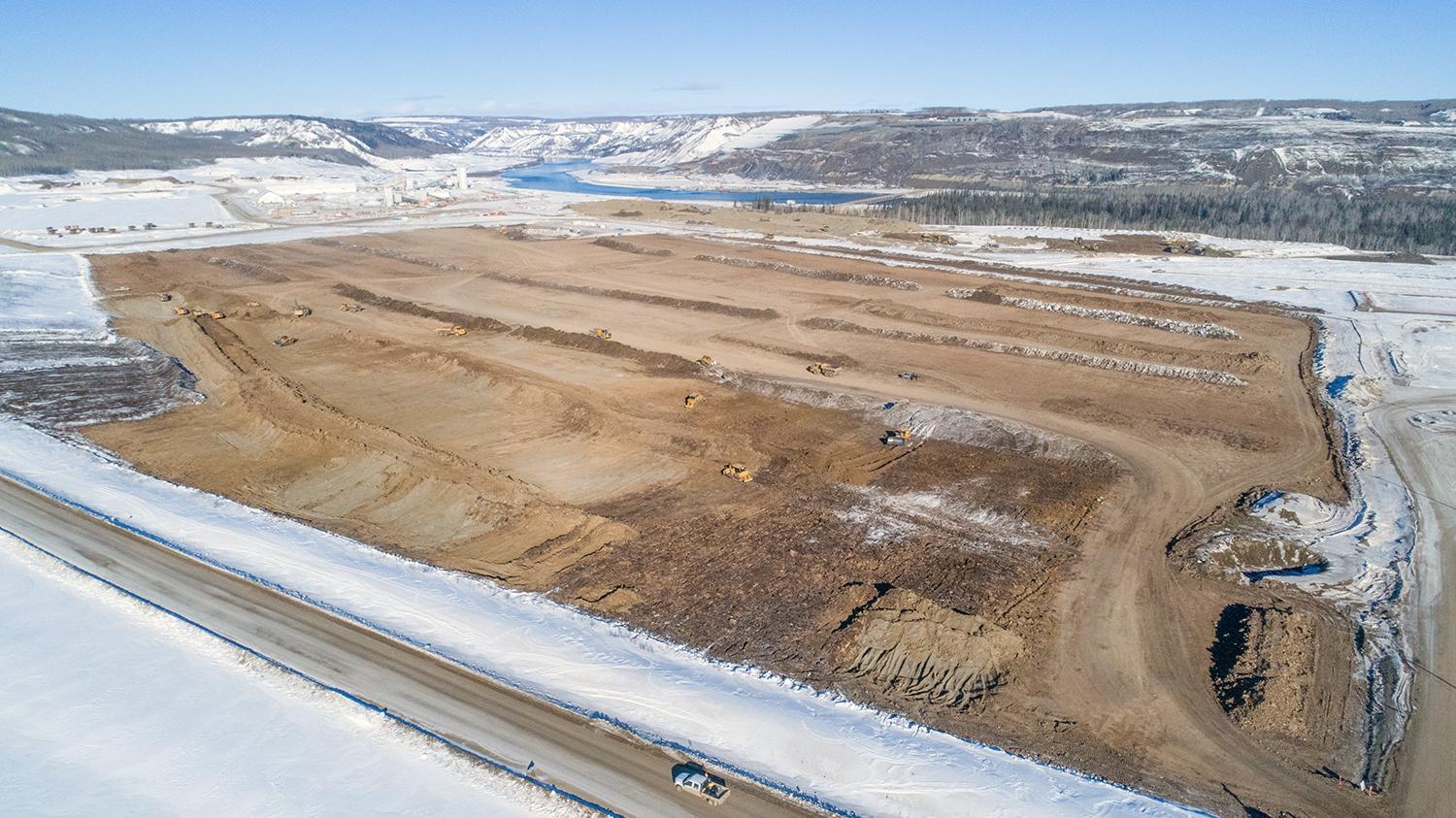 Aerial view of the south bank , with generating station and spillways aggregate area | February 2018