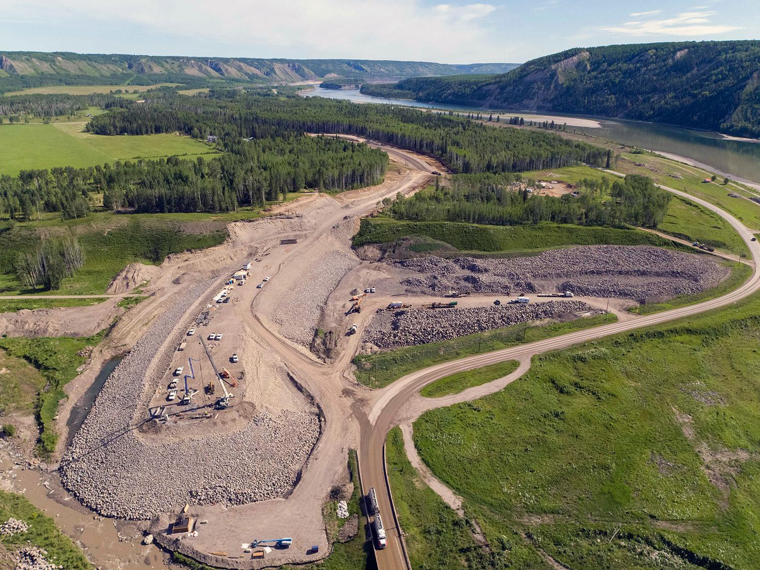 At Lynx Creek, crews prepare the east abutment where two bridge piers will be constructed for the new 150-metre bridge. | June 2021