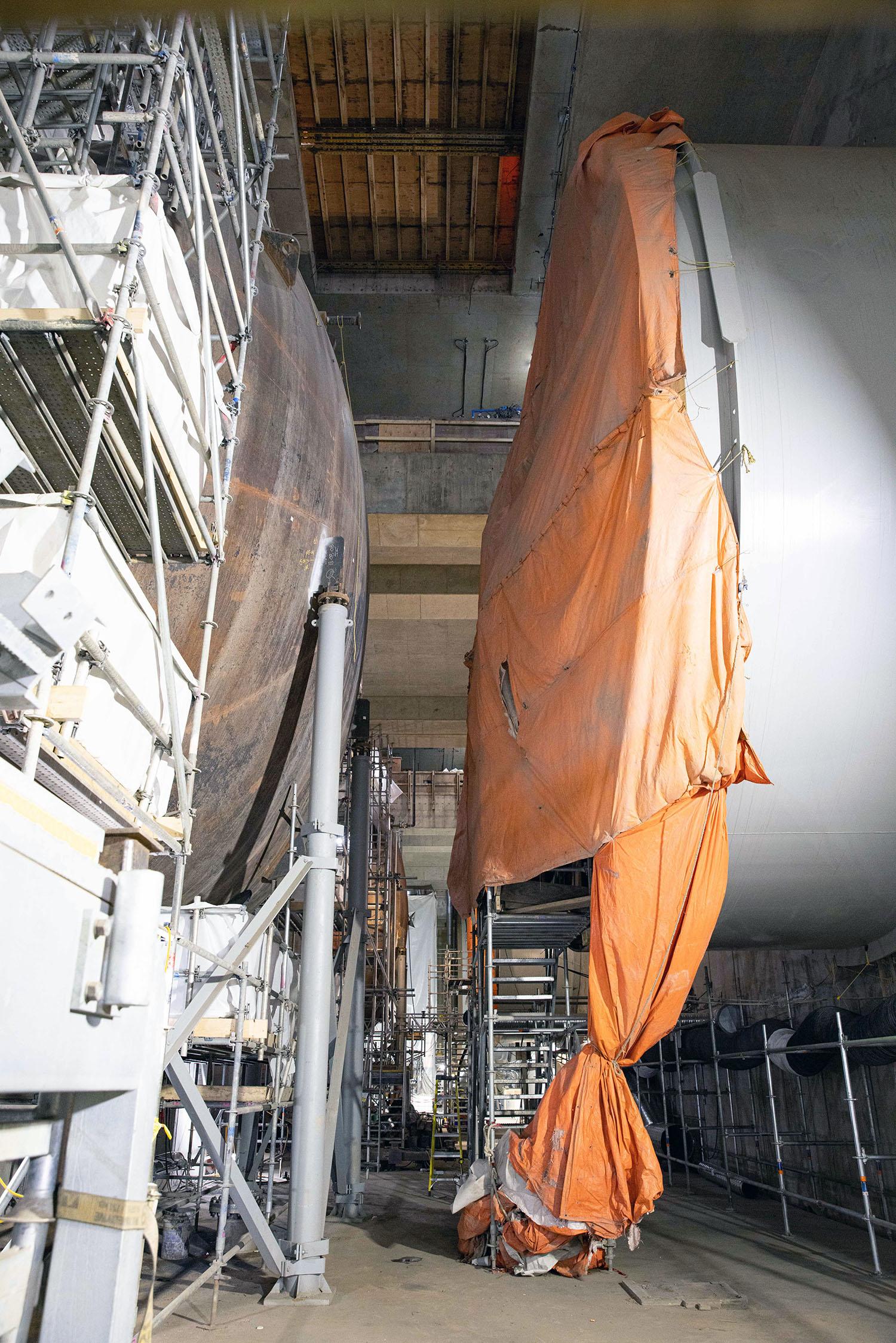These two sections will be connected to allow water to flow from a penstock unit on the right into a turbine unit on the left.