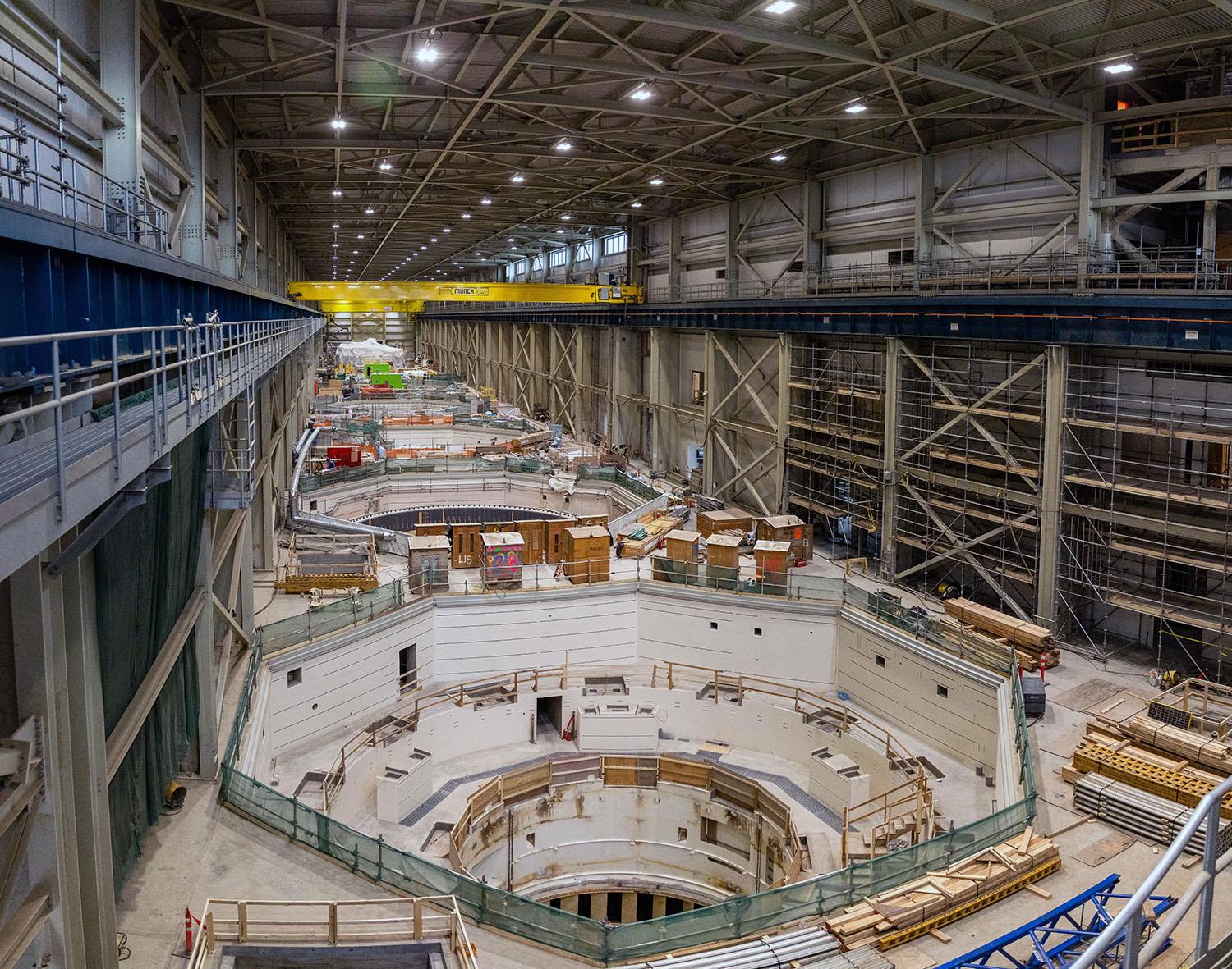 Six generating units inside the powerhouse are at varied stages of completion.