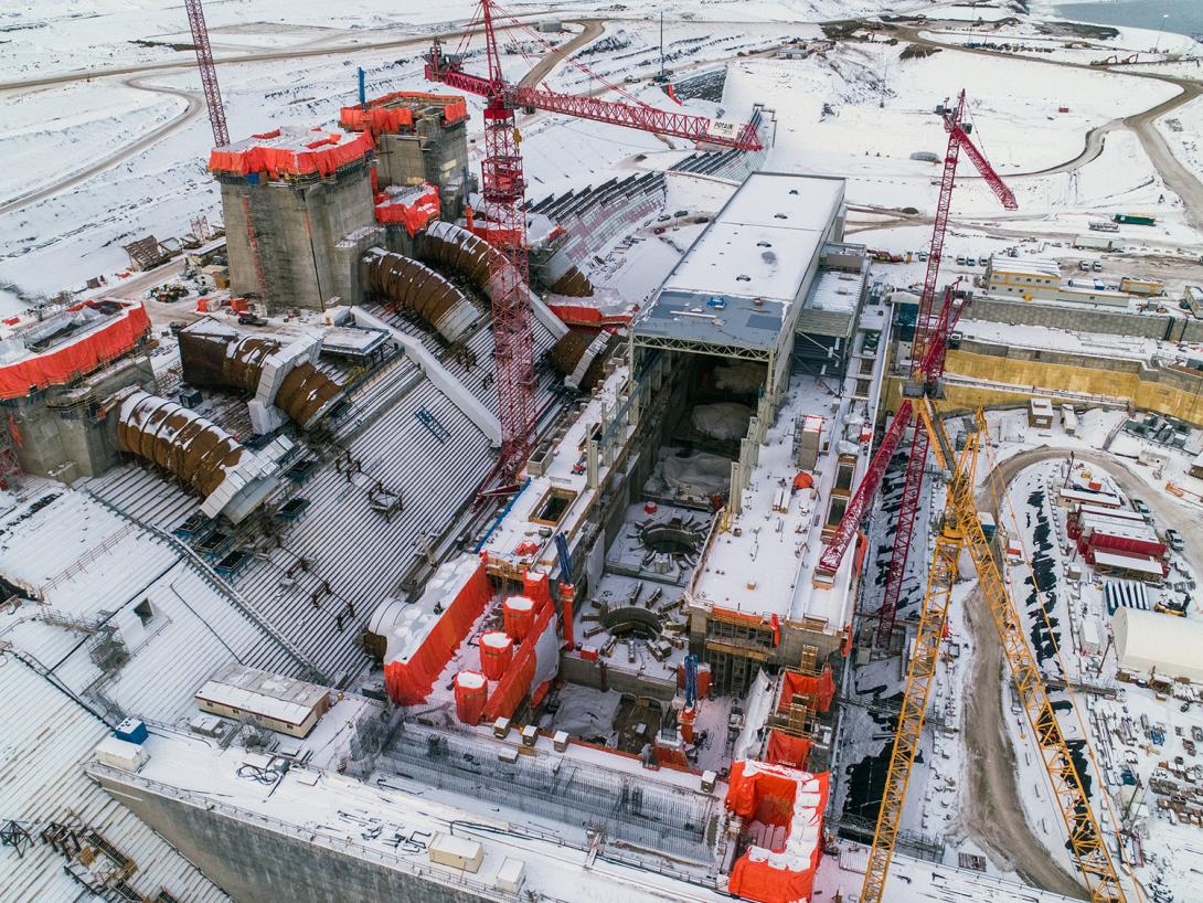 An aerial view of the Site C powerhouse, penstocks and intakes. | January 2021