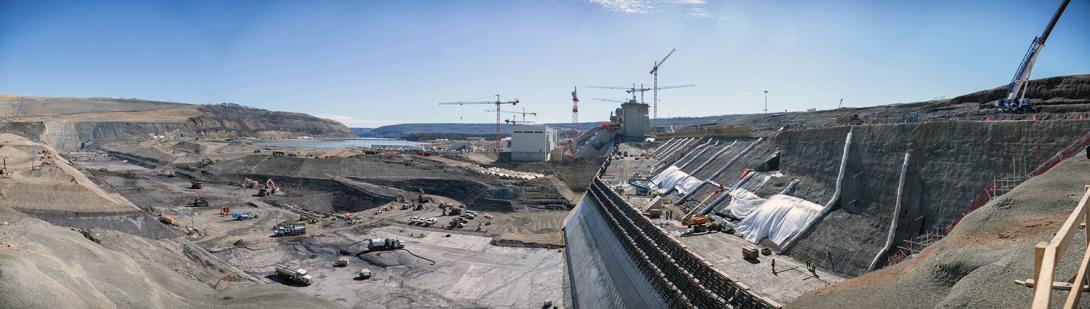 Crews continue to excavate the dam core trench, prepare for dam material placement, and prepare for roller-compacted concrete placements on the dam and core buttress. | April 2021