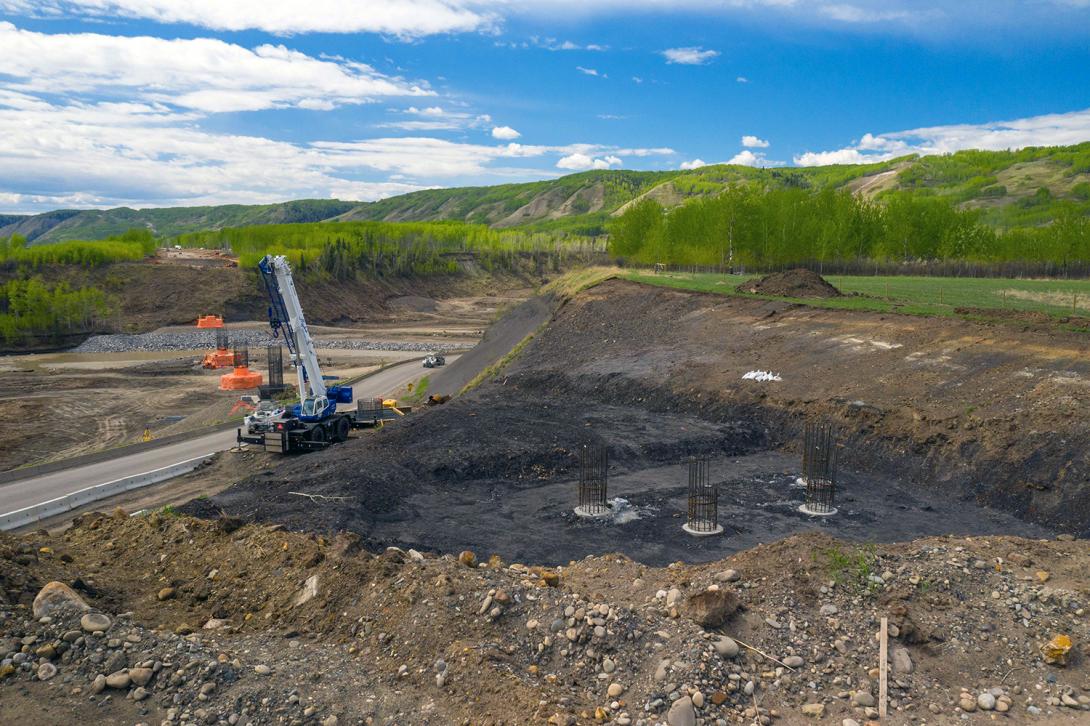 Construction on the new Highway 29 realignment at Farrell Creek. Crews are installing rebar, formwork and pouring concrete as part of the bridge foundation works. | May 2021