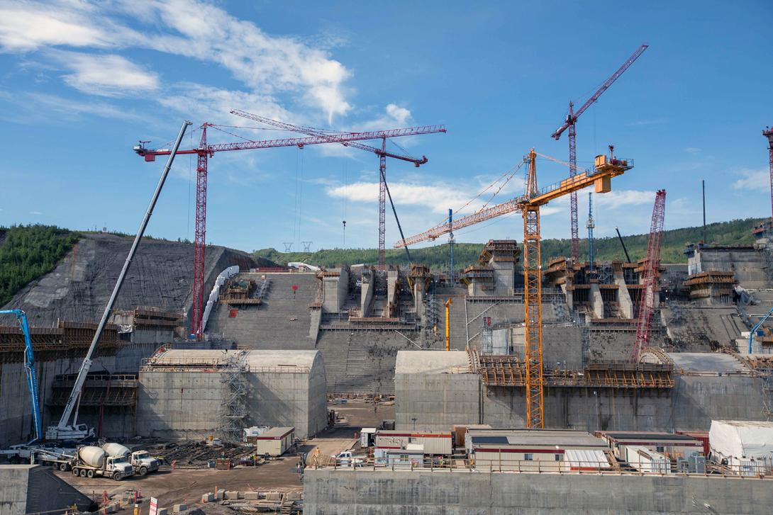 Work at the spillway gate structures and spill basin weirs is ongoing. | June 2021