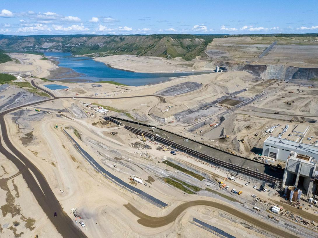 Construction is ongoing on the Roller-Compacted Concrete (RCC) Buttress and the dam core trench. | July 2021