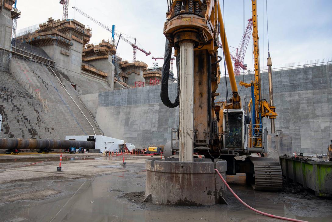 Holes are bored in the spillway area for the eventual installation of piles as part of the right bank foundation enhancement project. | October 2021