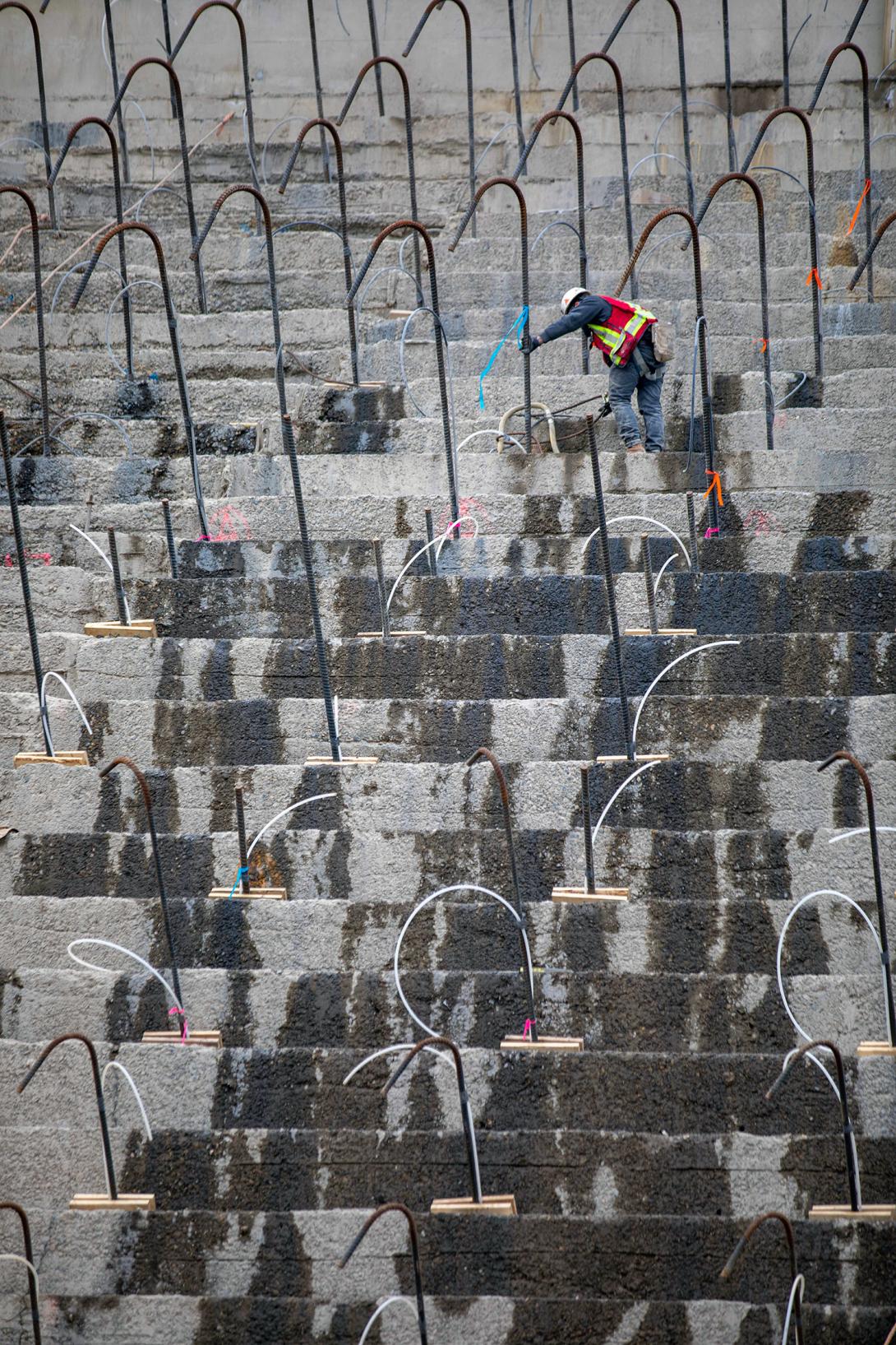 Installation of grounding rods in the spillway. A grounding grid is buried throughout the dam.   | October 2021