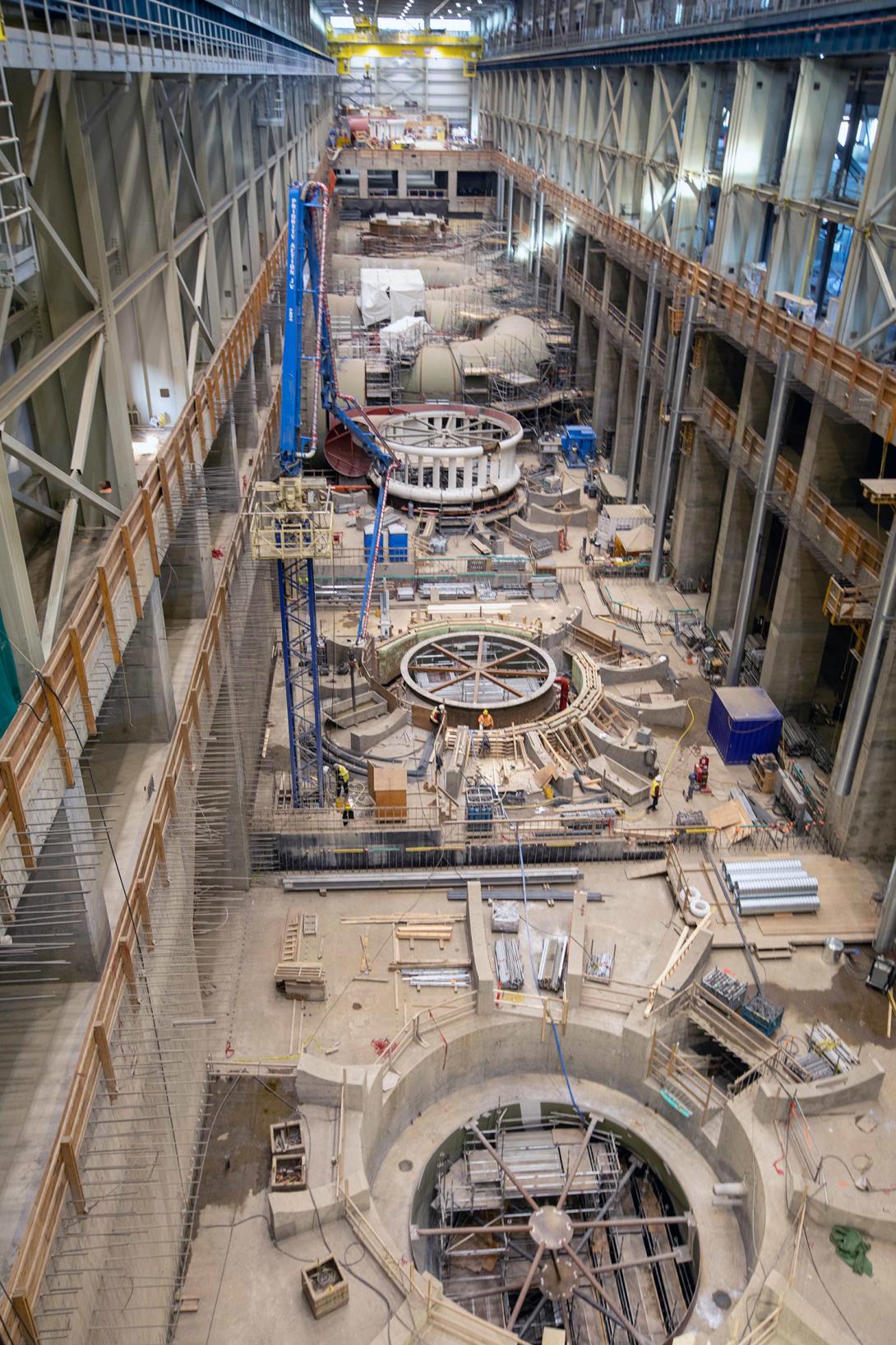 Formwork platform being lowered onto unit 5 penstock. | October 2021