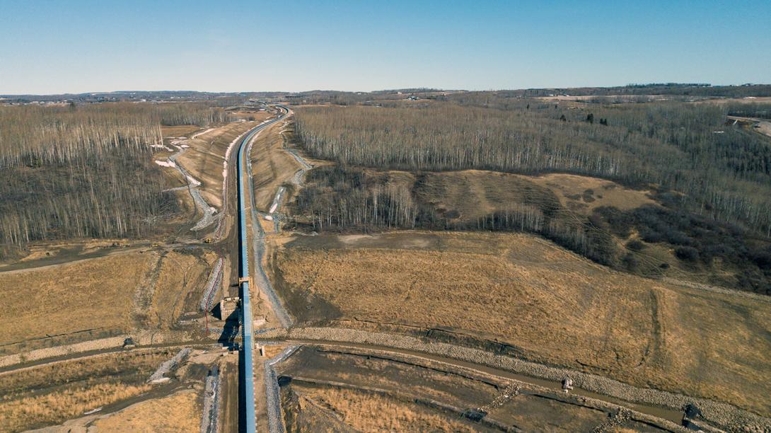 This conveyor belt will bring material from the 85th Ave industrial lands on Old Fort Rd. to the dam site. | April 2020