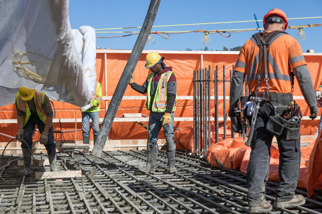 Placing concrete for the service bay | September 2018