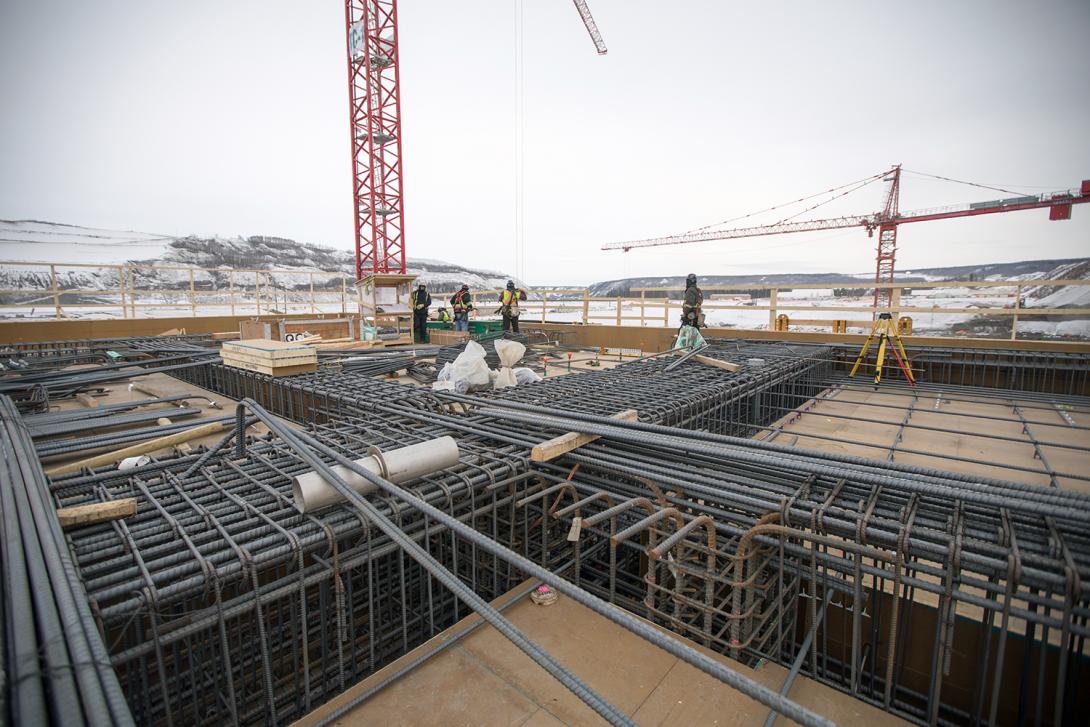 Looking northeast from the main service bay where rebar is being installed. | February 2019