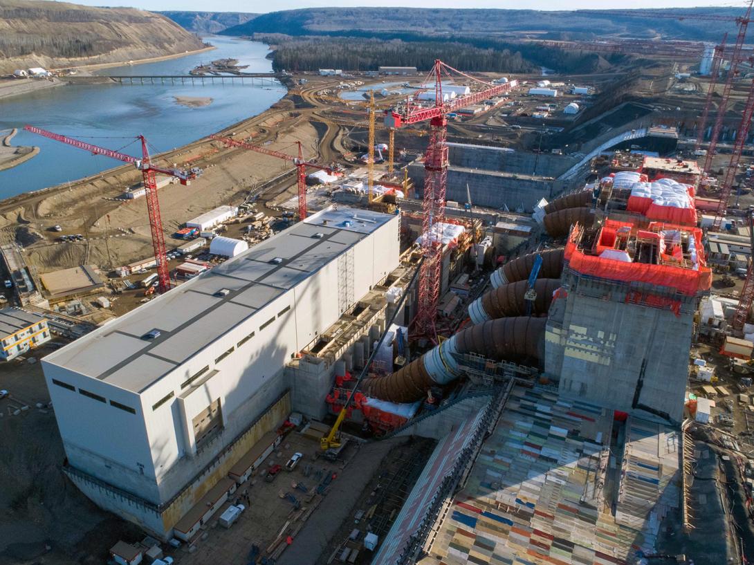 An aerial view of the Site C powerhouse, penstocks and intakes. | October 2020