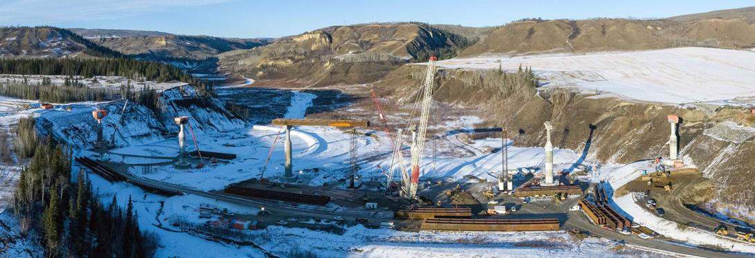 The first steel girders are installed for the Cache Creek bridge. | December 2021