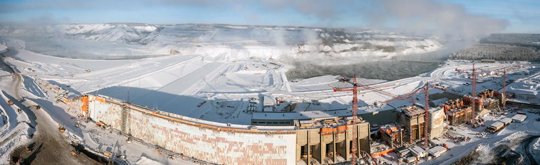 A north-facing panorama shows the dam core buttress, intakes and spillway structures overlooking the dam core trench. | December 