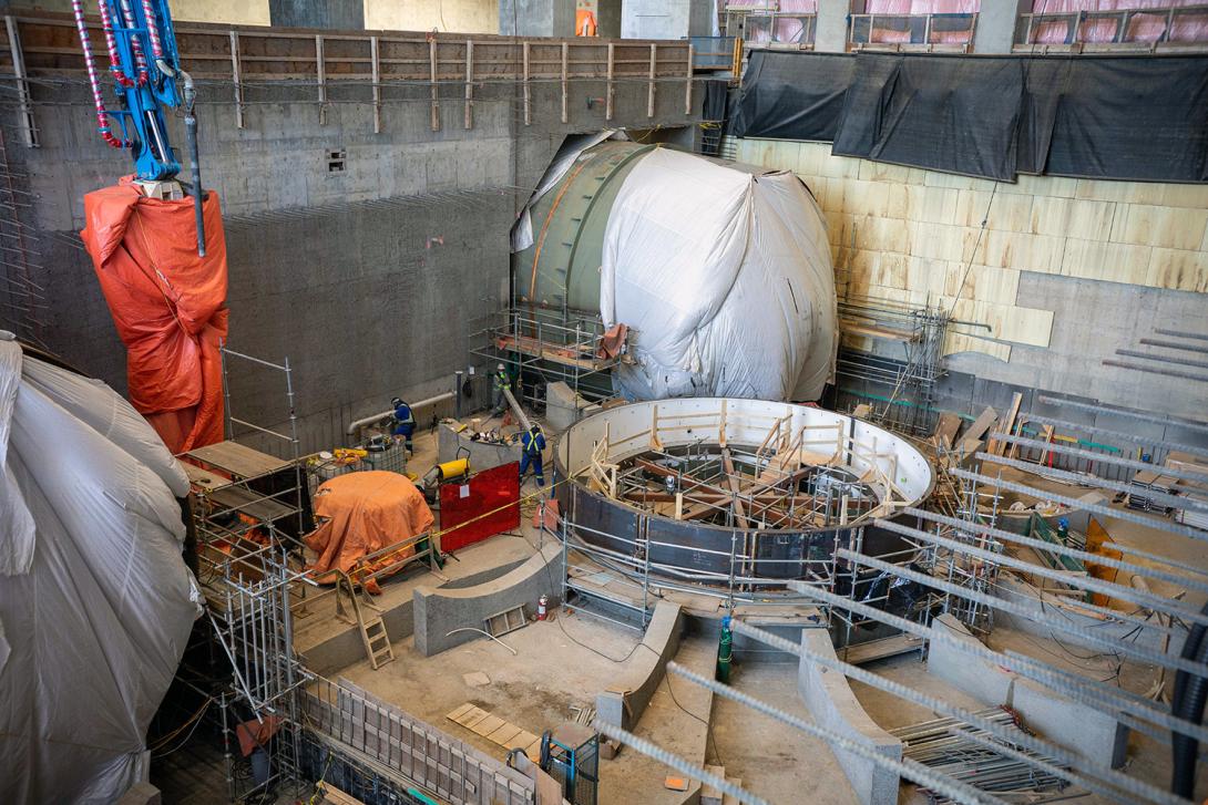 Crews have commenced installation of the turbine-embedded components for Units 1 and 2 inside the powerhouse. The Unit 1 draft tube cone and thrust ring are being prepared for stay ring installation. | February 2021