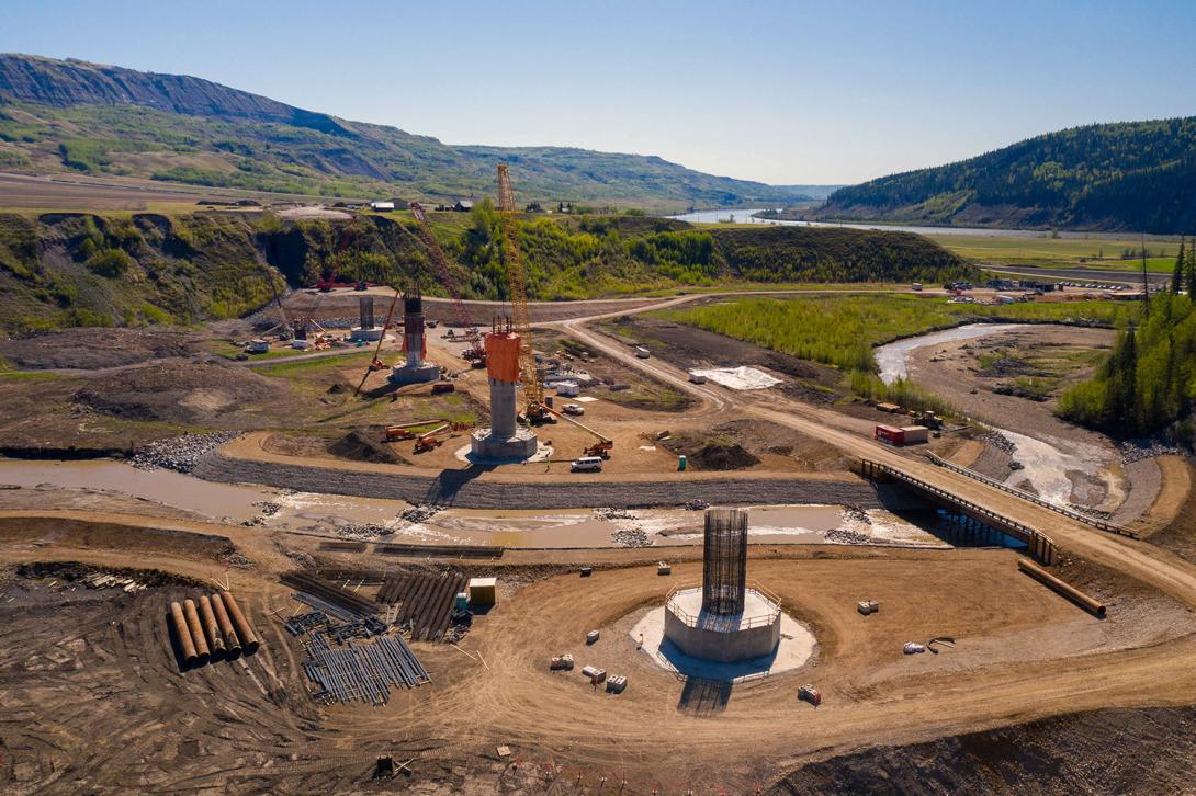 Six bridge piers in various stages of construction at Cache Creek. The new reservoir will cover the existing Highway 29 at Cache Creek East, requiring the construction of a new highway segment and a new bridge. | May 2021
