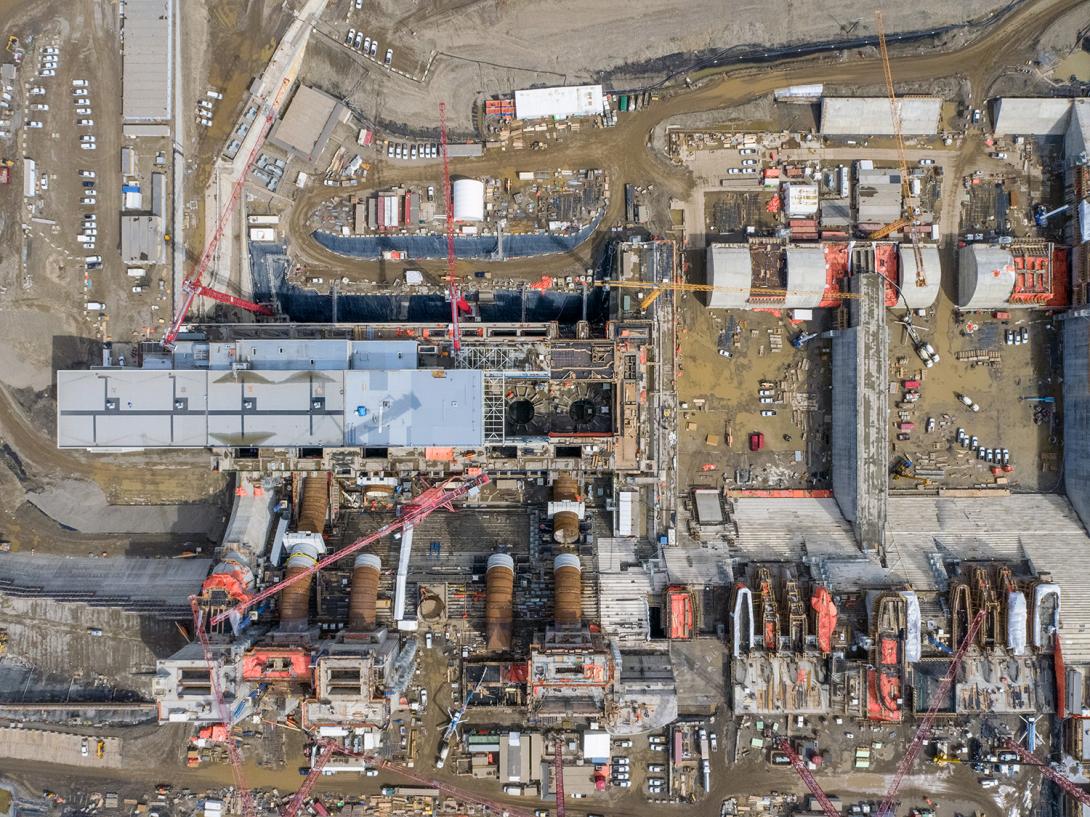 Overhead view of the Site C generating station and spillways. | April 2021