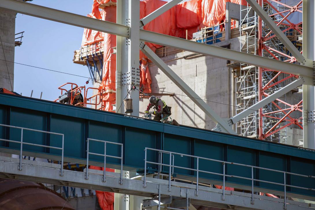 Crews install a crane rail in the powerhouse. | February 2021