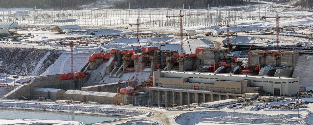 View of the approach channel dam buttress, intakes and spillways. | January 2022