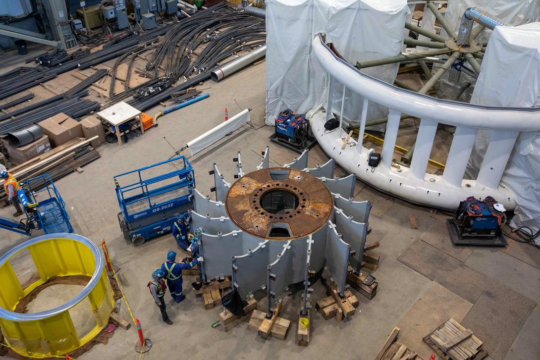 Protective coatings are removed from a rotor hub in preparation for assembly. | February 2022