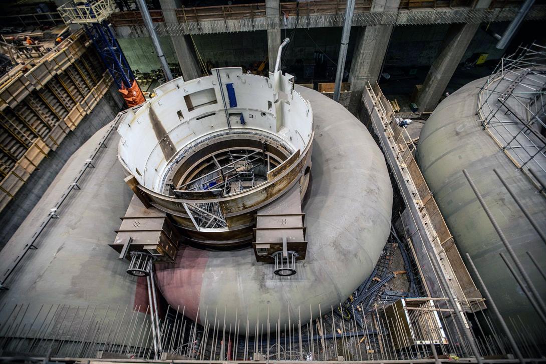 Unit 2 spiral case and upper pit liner are ready for embedment into the turbine. Formwork and rebar installation begin. | February 2022
