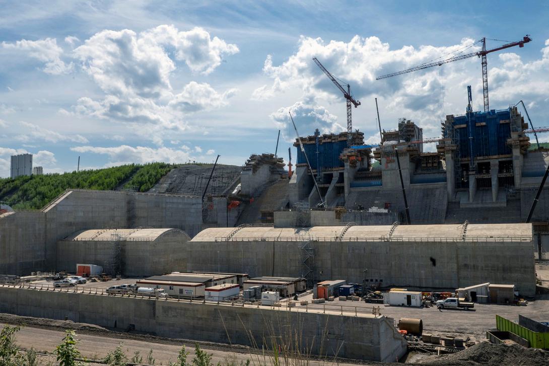 Construction of the spillways, the upper headworks and the stilling basin weirs, which is used for slowing the energy of the water. | June 2022