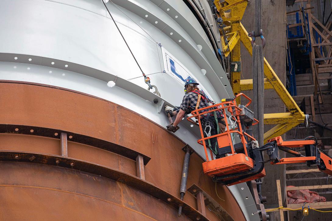 Large bolts connect the two penstock segments together. | June 2022