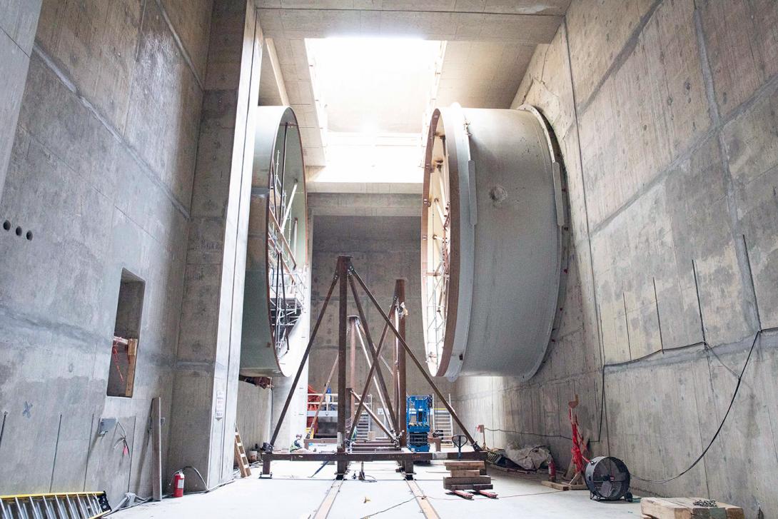 The unit 6 spiral case at left, and unit 6 penstock at right. | August 2022