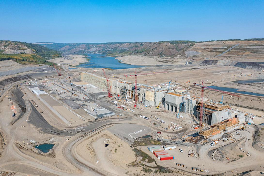 Aerial view of construction on the approach channel and powerhouse. | September 2022