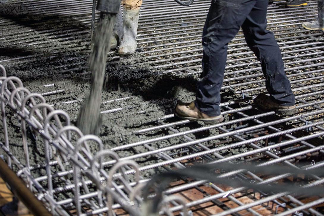 Pouring concrete on the Farrell Creek Bridge deck. | August 2022