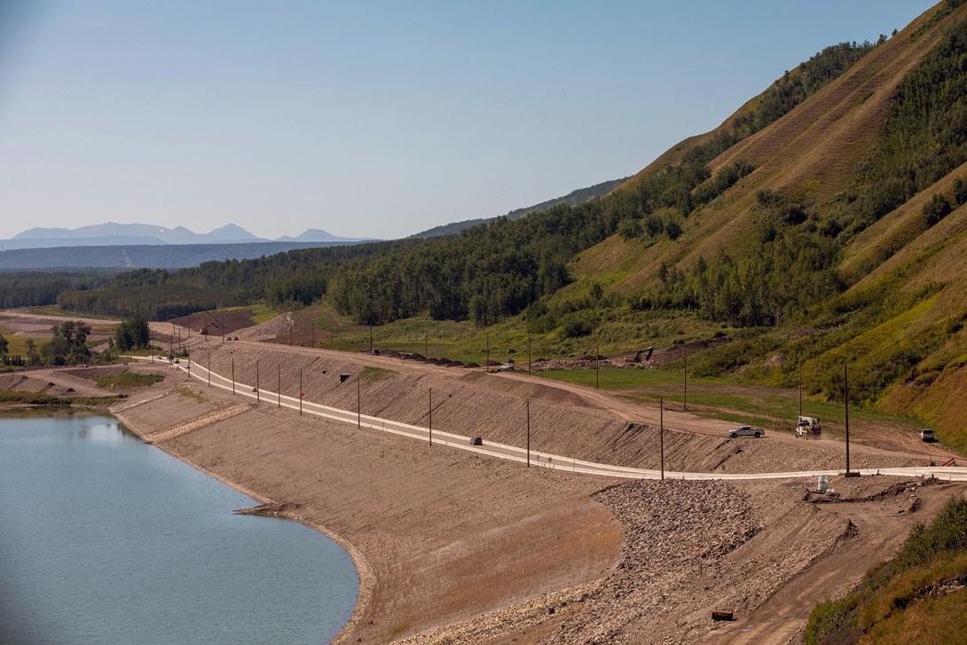 Road alignment construction on the Lynx Creek east embankment as traffic is detoured. | August 2022