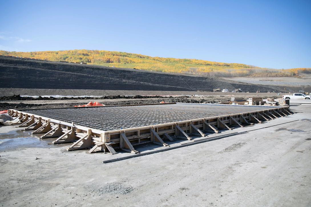 A concrete pour in the approach channel for the base of the central channel berm. ! September 2022