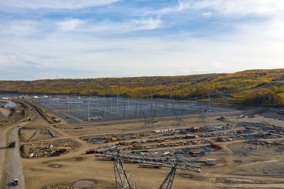East-facing view of the completed Site C substation. Transmission lines, on the towers in the foreground, will connect the substation to the Site C dam and generating station. ! September 2022