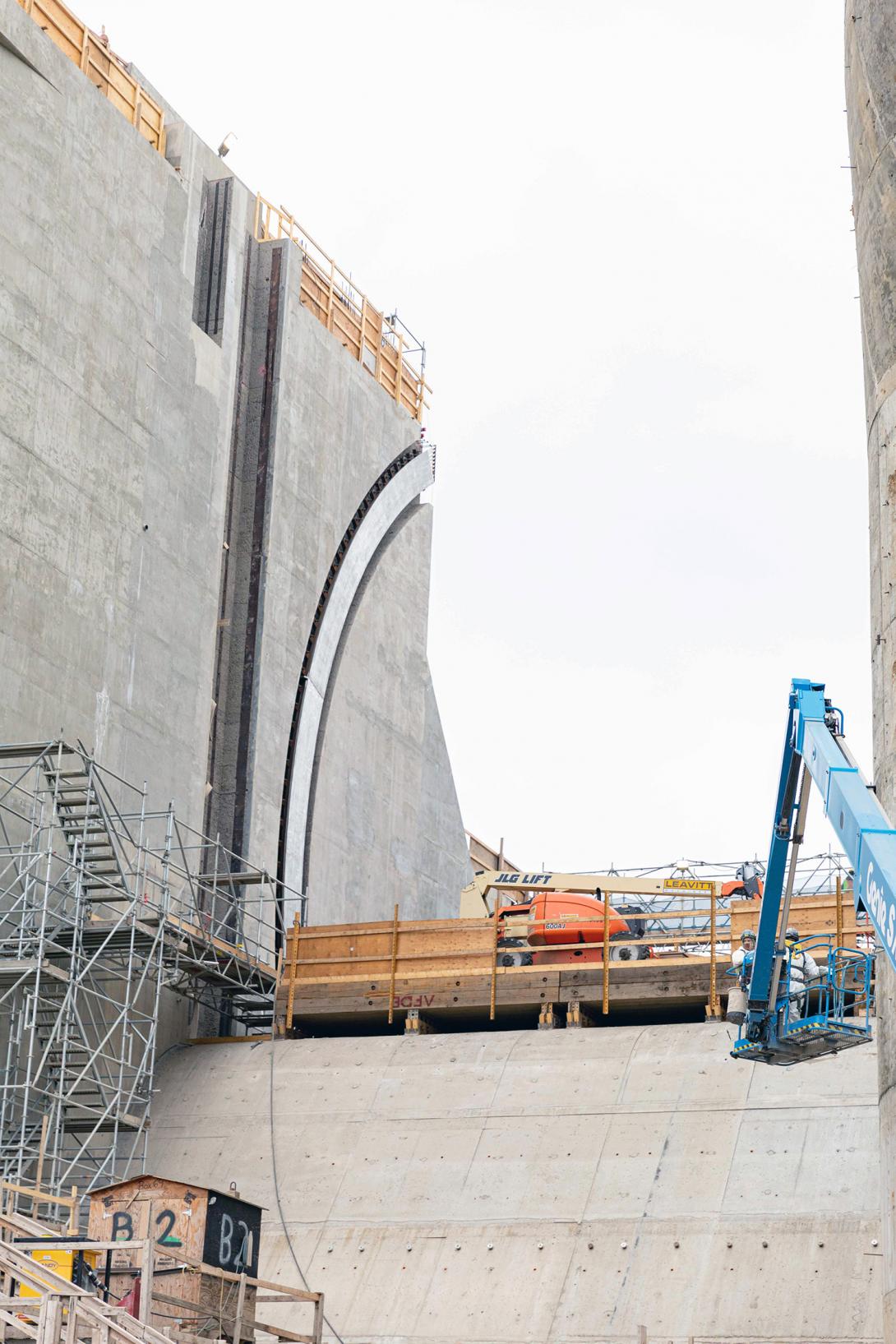 Gate guides for the radial and maintenance gates, which lift and allow water to flow into the spillway. | November 2022