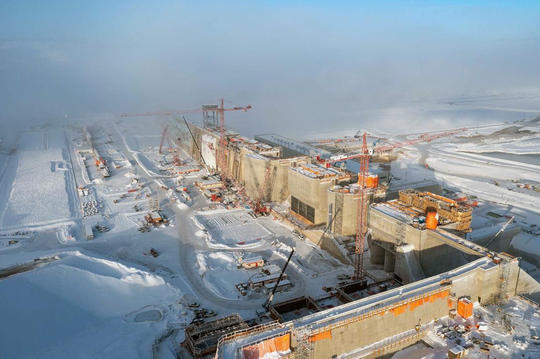 The upstream wall of the passive spillway (foreground) where water enters the spillway. | January 2023