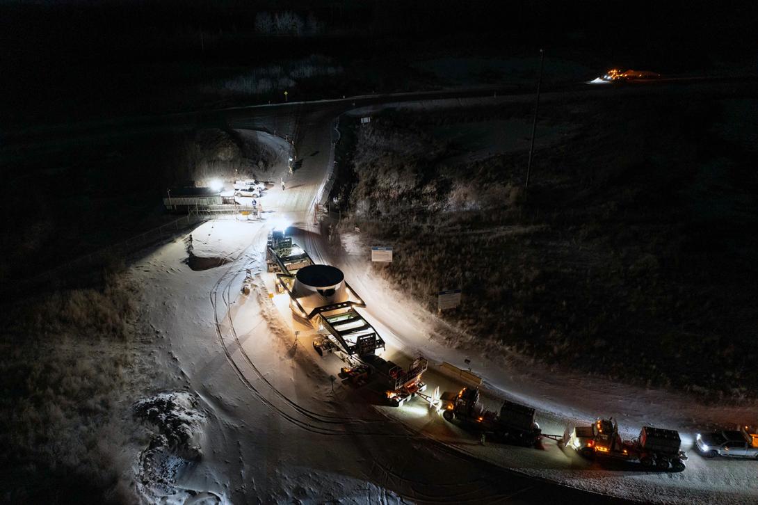 The fifth of six turbine runners is brought to Site C over frozen roads. | December 2022