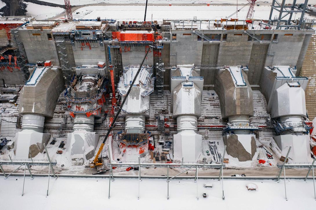 Formworks are being built to encase the penstocks in concrete. | January 2023