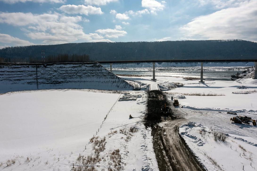 South-facing view of the Farrell Creek bridge on Highway 29 where the original highway section has been removed and coarse woody debris will be spread. | March 2023