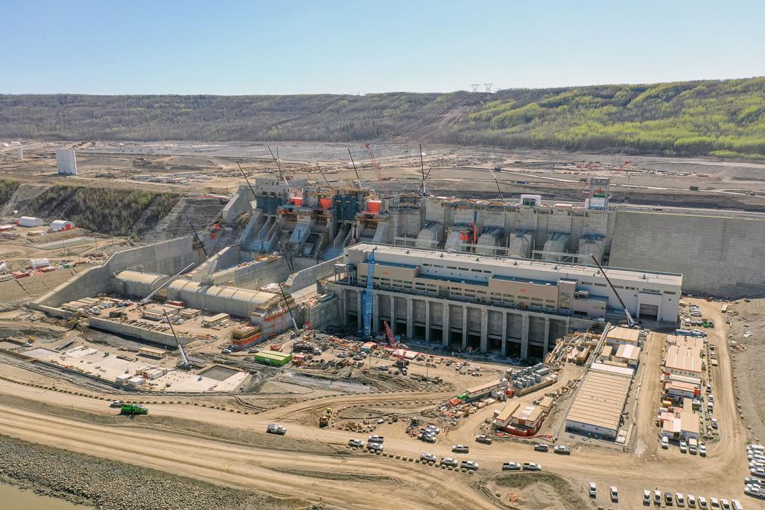 Generating station, spillways, and tailrace under construction. | May 2023