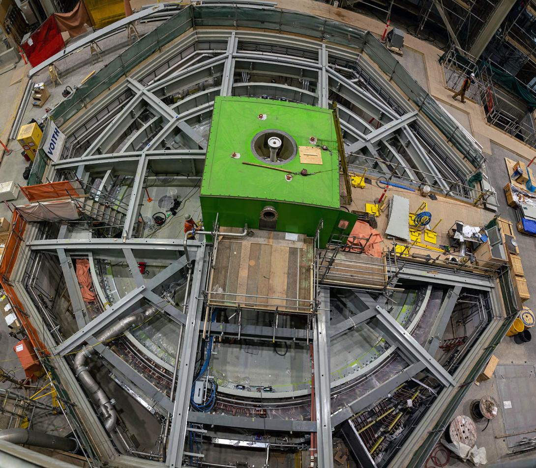 The green box is the housing for the brush gears. Preparing for top cover installation on the upper bracket for turbine unit 1. | May 2023