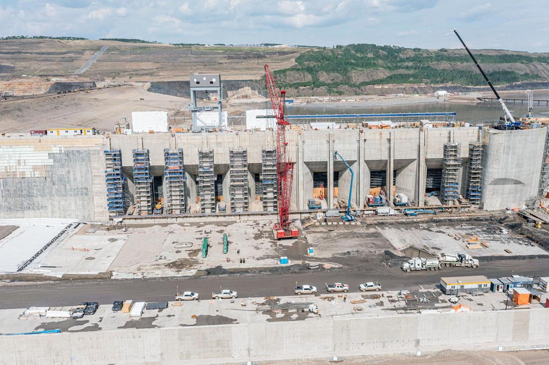 Installing trash rack guides on units four and five. Trash racks, or debris screens, stop material from entering the intakes and damaging the turbine units. | May 2023