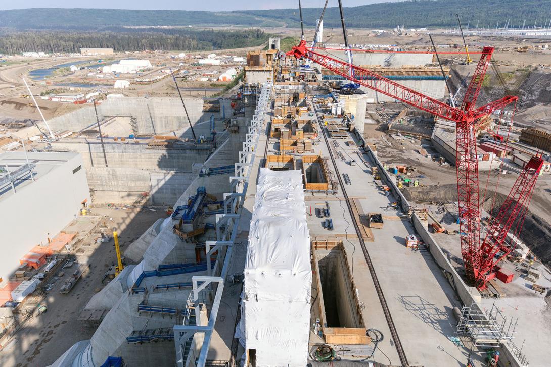 View over the top of the intake structure. Each penstock has an intake gate which can be lowered to close the unit for maintenance. | July 2023
