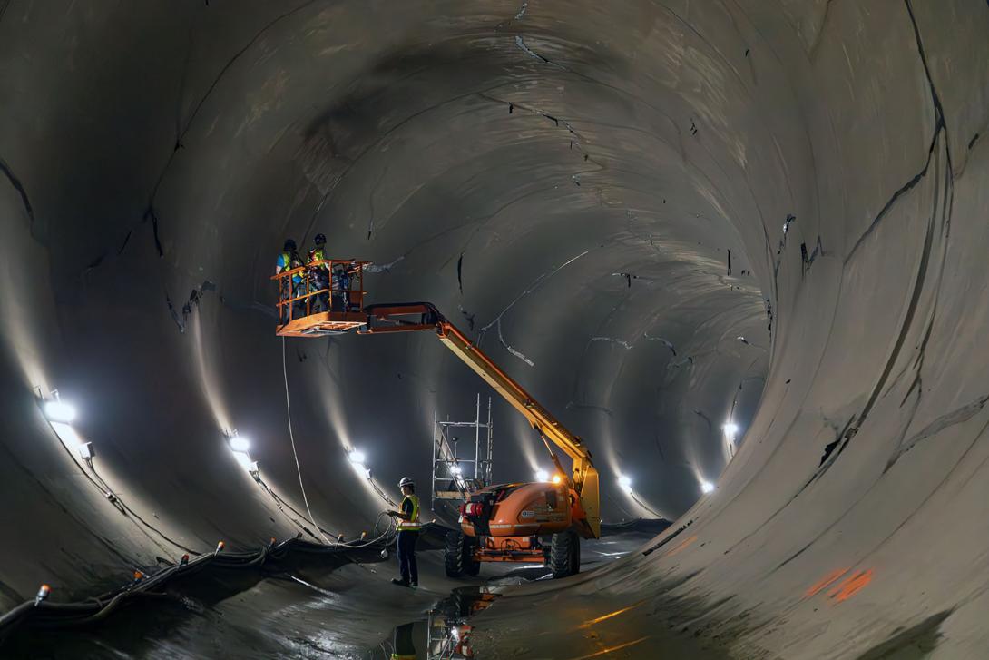 The recently drained tunnel was inspected before installing four large rings. When the rings are in place, diversion tunnel two will reopen but the water flow will be restricted. | July 2023