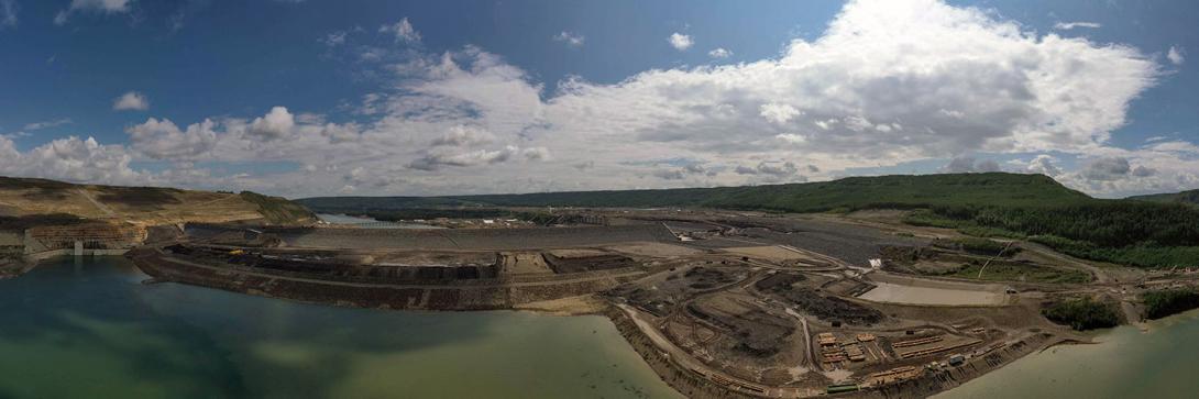 Panorama of the upstream side of the earthfill dam. | August 2023