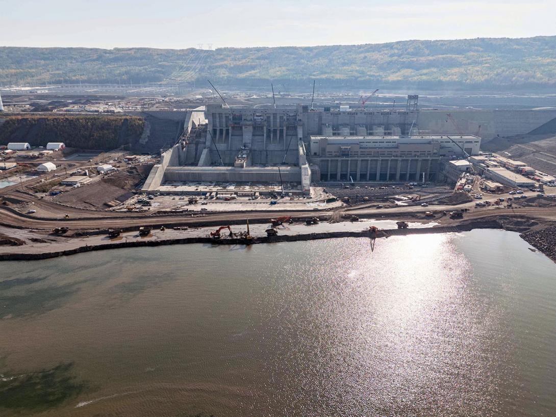 Excavators have started removing the right bank coffer dam as work on the spillways and tailrace nears completion.