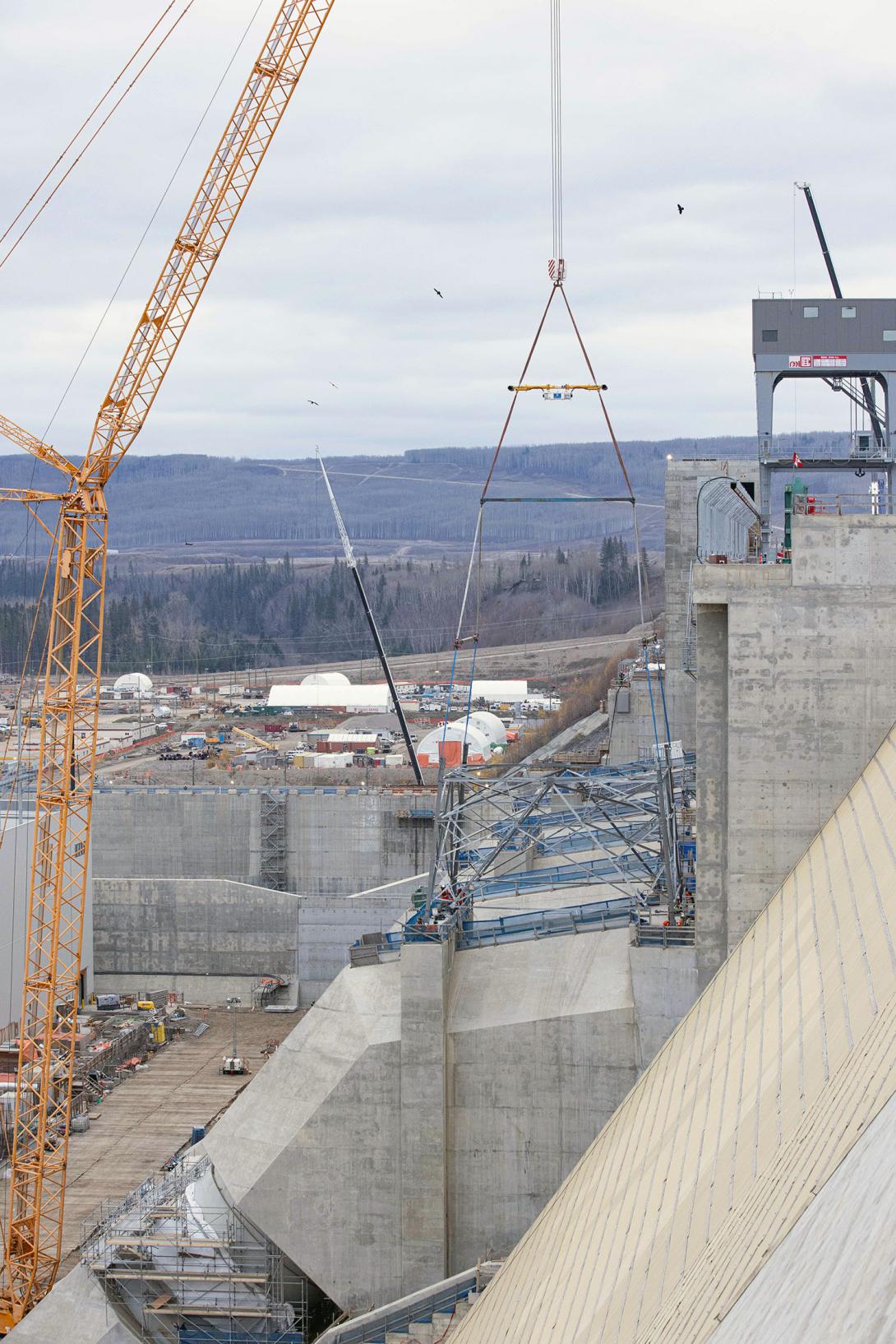 The base for the first transmission tower is positioned on penstock unit 1.