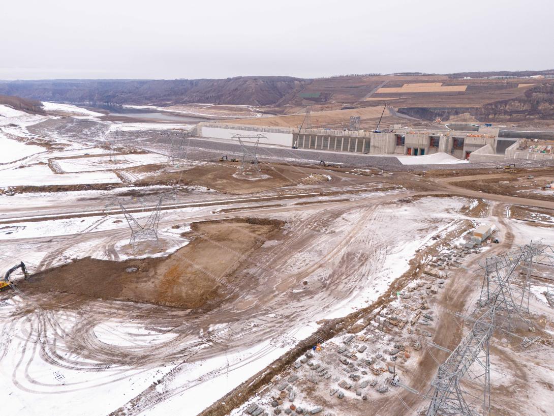 The Site C substation will be connected to the generating station this spring. Once all three transmission towers on top of the penstocks are installed, cables will be strung across the approach channel.
